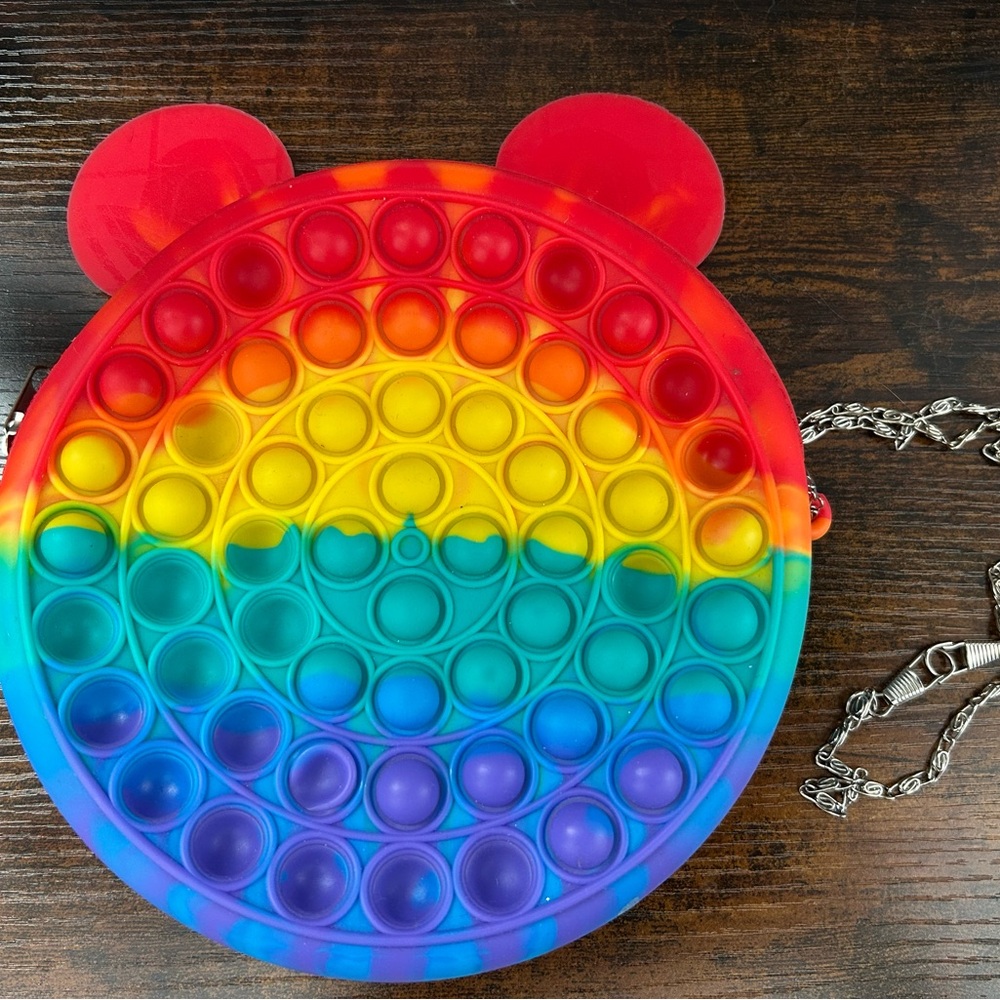 Vibrant Rainbow Puzzle bag with Mickey-Like Design